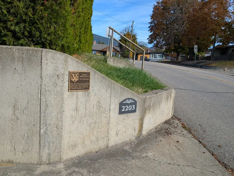 The retaining wall at 2203 30th Avenue, with the City's heritage plaque